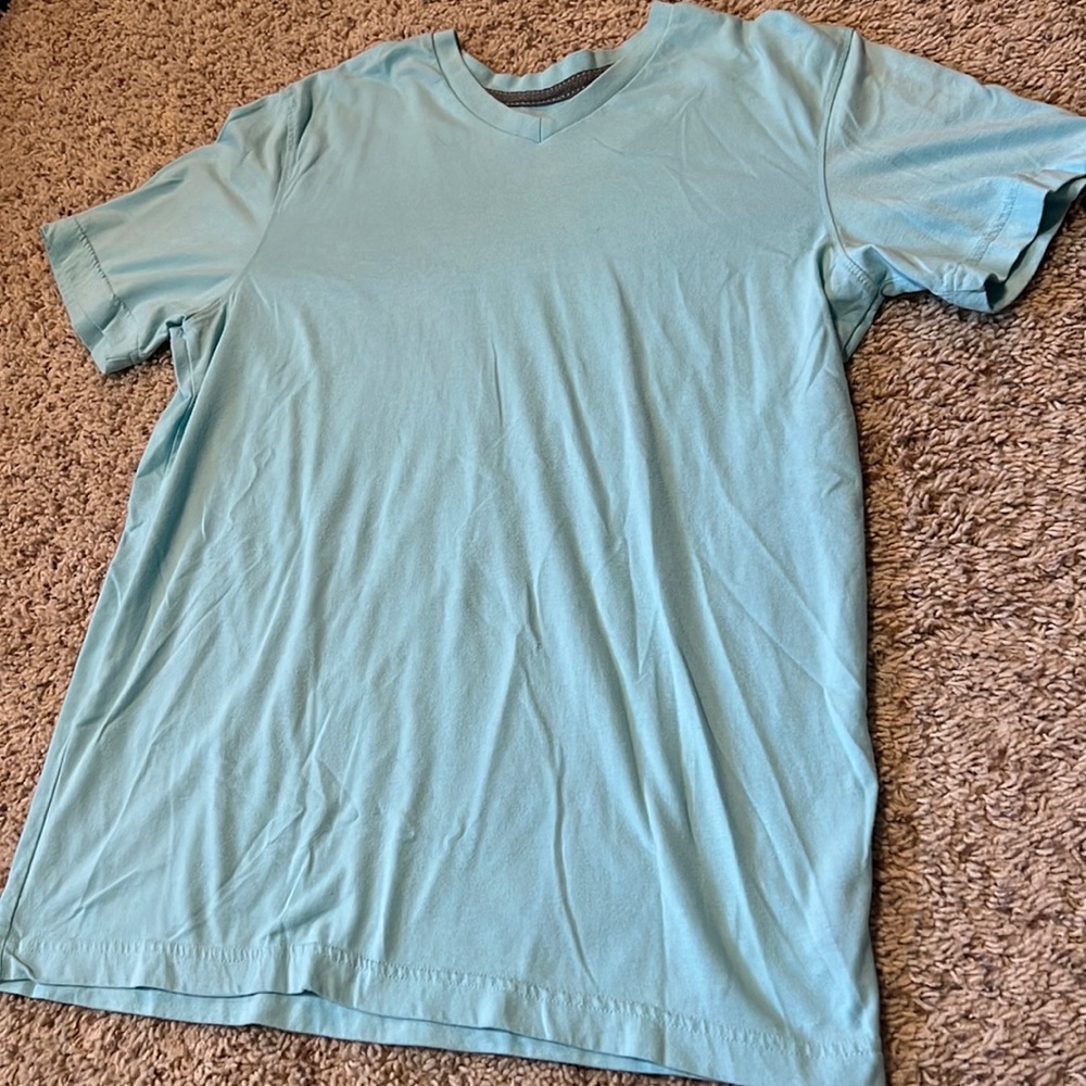 Barely worn soft men’s v-neck short-sleeved tee in beautiful baby blue - size M!